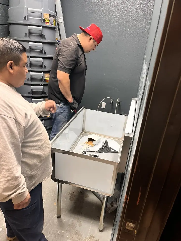 Commercial plumbing and sink installation in Phelps